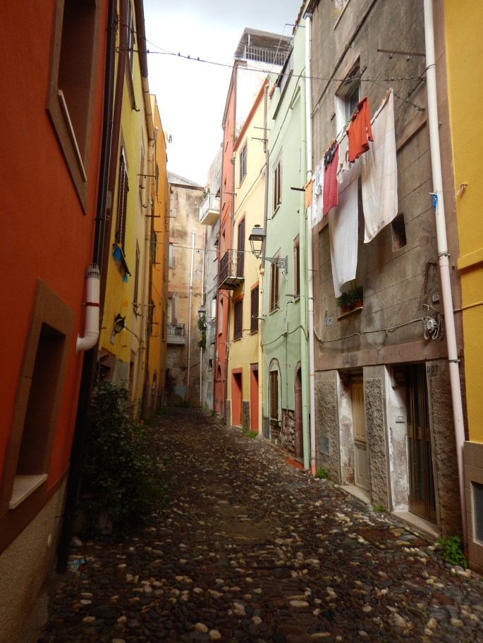 Bosa was next, a bus ride down the coast from Alghero. The red building on the left is our guesthouse. Good artichoke pizza here...