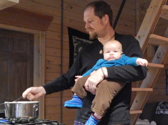 Helping Dad make pancakes